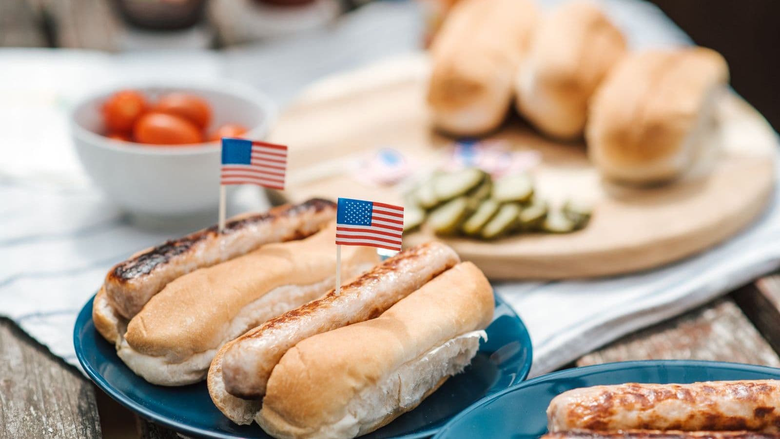 Hot dogs on a plate with buns - Can Dogs Eat Hot Dogs? Occasional Training Treats Only