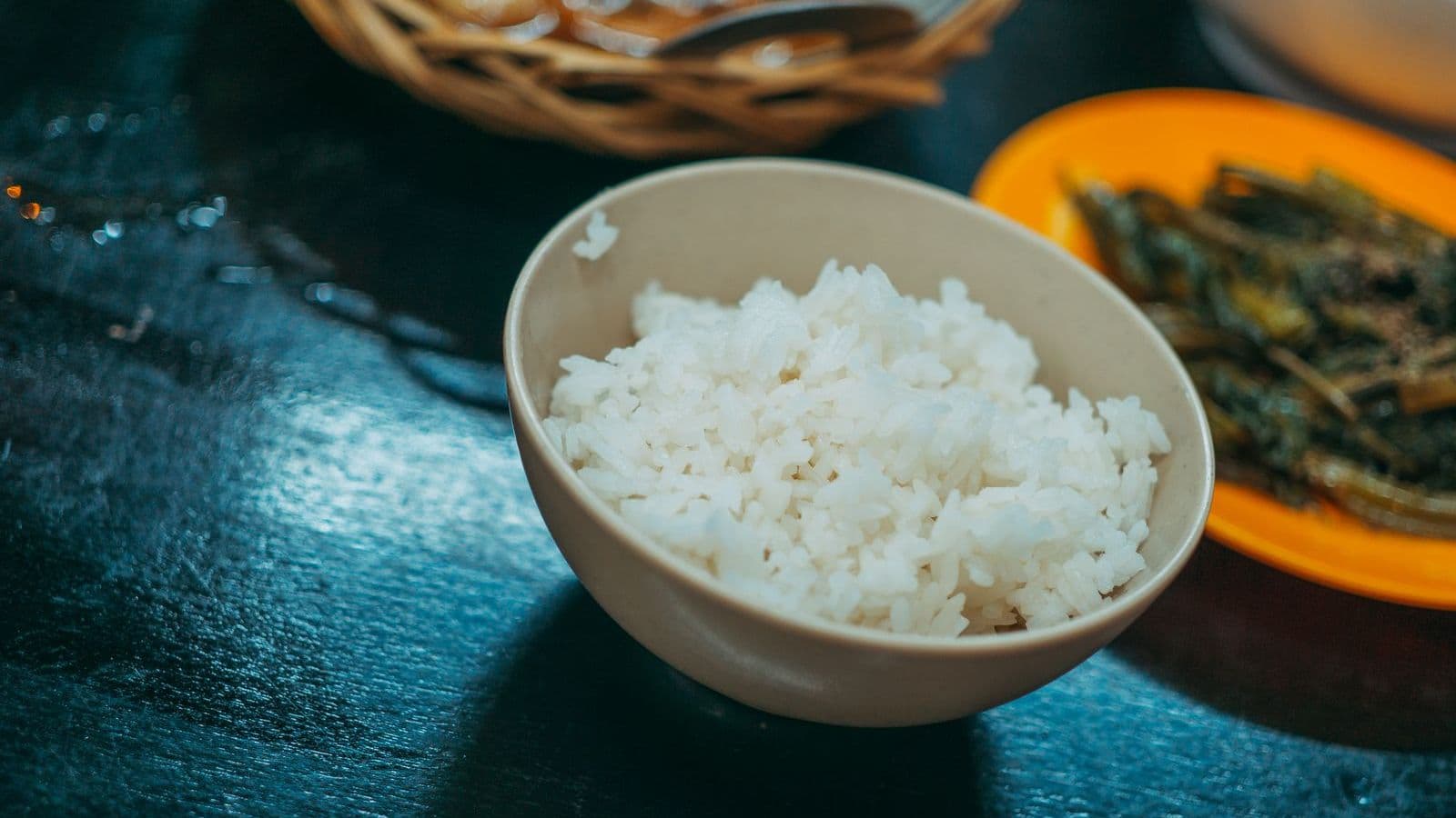 A small bowl of cooked rice - Can Dogs Eat Rice? Plain Cooked White or Brown